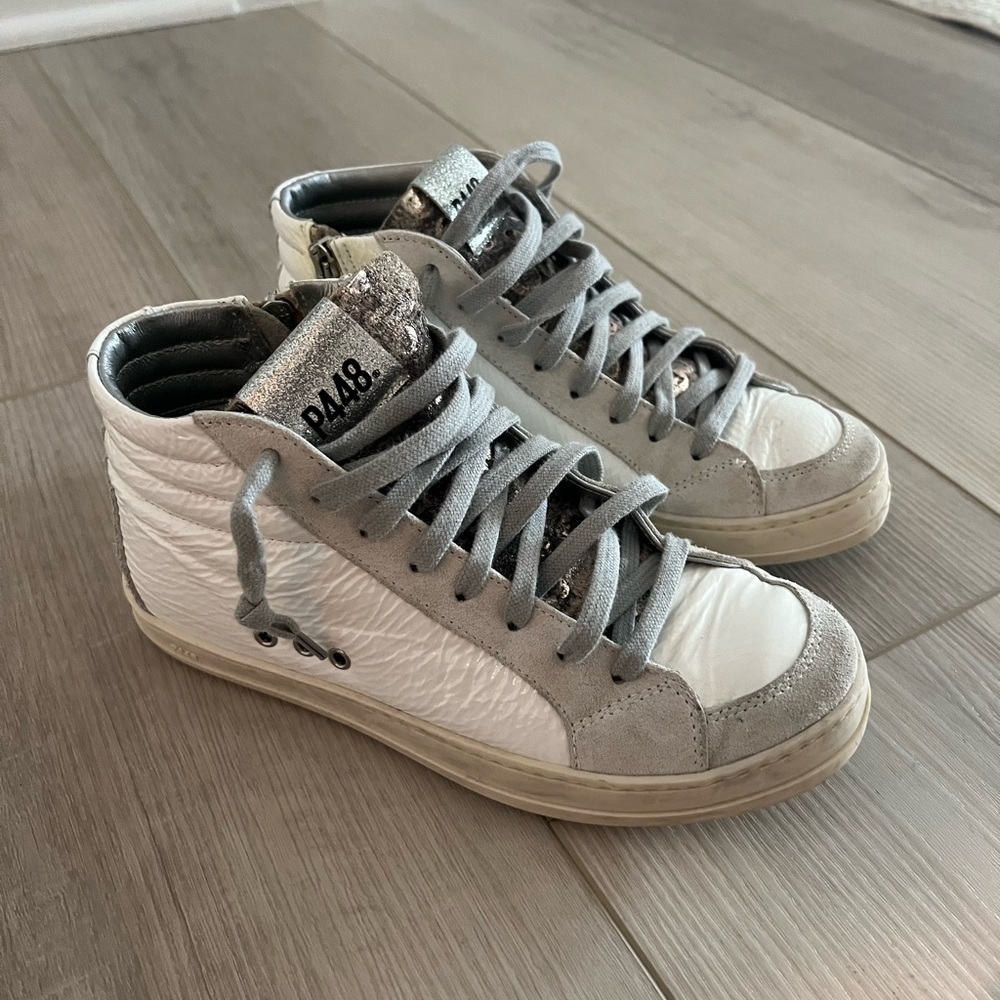 P448 Womens, white mid top with zippers on the side. Super comfy!